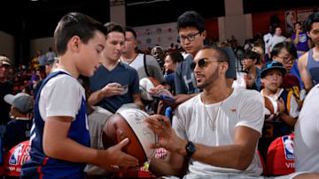 LAS VEGAS, NV - JULY 9: Rudy Gobert #27 of the Utah Jazz signs an autograph for a fan during the 2017 Las Vegas Summer League. (Photo by David Dow/NBAE via Getty Images)