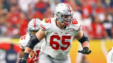 Jan 1, 2016; Glendale, AZ, USA; Ohio State Buckeyes offensive lineman Pat Elflein (65) against the Notre Dame Fighting Irish during the 2016 Fiesta Bowl at University of Phoenix Stadium. The Buckeyes defeated the Fighting Irish 44-28. Mandatory Credit: Mark J. Rebilas-USA TODAY Sports