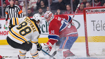MONTREAL, QC - DECEMBER 17: Boston Bruins right wing David Pastrnak (88) tries to deviate a pass toward Montreal Canadiens goaltender Carey Price (31) net during the first period of the NHL game between the Boston Bruins and the Montreal Canadiens on December 17, 2018, at the Bell Centre in Montreal, QC (Photo by Vincent Ethier/Icon Sportswire via Getty Images)