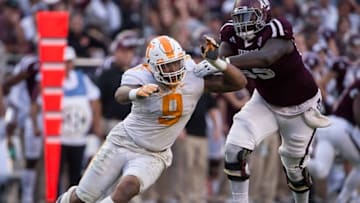 Oct 8, 2016; College Station, TX, USA; Tennessee Volunteers defensive end Derek Barnett (9) and Texas A&M Aggies offensive lineman Avery Gennesy (65) in action during the game at Kyle Field. The Aggies defeat the Volunteers 45-38 in overtime. Mandatory Credit: Jerome Miron-USA TODAY Sports