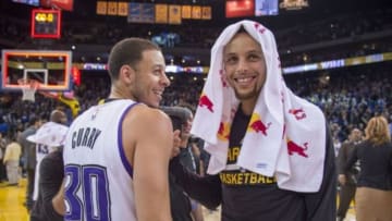 November 28, 2015; Oakland, CA, USA; Sacramento Kings guard Seth Curry (30, left) smiles while talking with Golden State Warriors guard Stephen Curry (30, right) after the game at Oracle Arena. The Warriors defeated the Kings 120-101. Mandatory Credit: Kyle Terada-USA TODAY Sports
