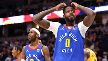 DENVER, CO - JANUARY 05: JaMychal Green #0 of the Denver Nuggets reacts to a call against the Utah Jazz during the fourth quarter at Ball Arena on January 5, 2022 in Denver, Colorado. NOTE TO USER: User expressly acknowledges and agrees that, by downloading and or using this photograph, User is consenting to the terms and conditions of the Getty Images License Agreement. (Photo by C. Morgan Engel/Getty Images)