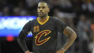 Nov 4, 2015; Cleveland, OH, USA; Cleveland Cavaliers forward LeBron James (23) stands on the court after ripping his jersey sleeves in the second quarter against the New York Knicks at Quicken Loans Arena. Mandatory Credit: David Richard-USA TODAY Sports