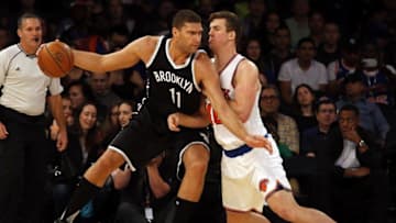 Oct 8, 2016; New York, NY, USA; Brooklyn Nets center Brook Lopez (11) drives to the basket defended by New York Knicks center Marshall Plumlee (40) during the first half at Madison Square Garden. Mandatory Credit: Adam Hunger-USA TODAY Sports
