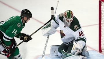 Apr 16, 2016; Dallas, TX, USA; Dallas Stars left wing Jamie Benn (14) scores the game winning goal against Minnesota Wild goalie Devan Dubnyk (40) during the third period of game two of the first round of the 2016 Stanley Cup Playoffs at the American Airlines Center. The Stars defeat the Wild 2-1. Mandatory Credit: Jerome Miron-USA TODAY Sports