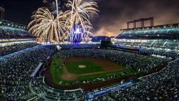 DENVER, CO - SEPTEMBER 20: Fireworks are set over the field as spectators fill the outfield after a game between the Colorado Rockies and the Arizona Diamondbacks at Coors Field on September 20, 2013 in Denver, Colorado. The Rockies beat the Diamondbacks 9-4. (Photo by Dustin Bradford/Getty Images)