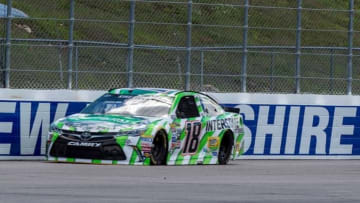 Jul 16, 2016; Loudon, NH, USA; Sprint Cup Series driver Kyle Busch (18) drives down the back stretch during practice for the New Hampshire 301 at New Hampshire Motor Speedway. Mandatory Credit: Jerome Miron-USA TODAY Sports