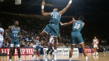 NEW YORK - CIRCA 1992: Alonzo Mourning #33 of the Charlotte Hornets grabs a rebound against the New York Knicks during an NBA basketball game circa 1992 at Madison Square Garden in the Manhattan borough of New York City. Mourning played for the Hornets from 1992-95. (Photo by Focus on Sport/Getty Images)