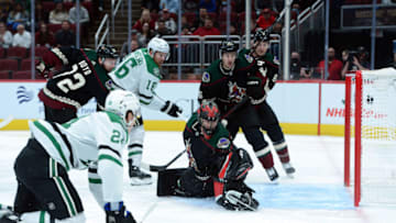 Nov 27, 2021; Glendale, Arizona, USA; Dallas Stars left wing Roope Hintz (24) shoots and scores a goal against Arizona Coyotes goaltender Scott Wedgewood (31) during the first period at Gila River Arena. Mandatory Credit: Joe Camporeale-USA TODAY Sports