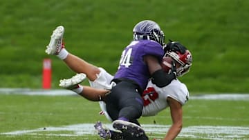 Oct 22, 2016; Evanston, IL, USA; Northwestern Wildcats cornerback Montre Hartage (24) intercepts a pass intended for Indiana Hoosiers wide receiver Luke Timian (82) in the second quarter at Ryan Field. Mandatory Credit: Jerry Lai-USA TODAY Sports
