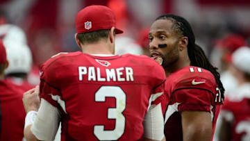 Sep 27, 2015; Glendale, AZ, USA; Arizona Cardinals quarterback Carson Palmer (3) and Arizona Cardinals wide receiver Larry Fitzgerald (11) talk on the sidelines during the second half against the San Francisco 49ers at University of Phoenix Stadium. The Cardinals won 47-7. Mandatory Credit: Joe Camporeale-USA TODAY Sports