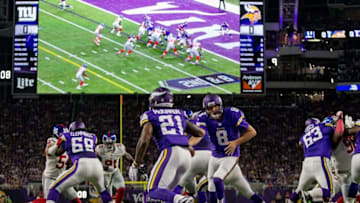 Oct 3, 2016; Minneapolis, MN, USA; Minnesota Vikings quarterback Sam Bradford (8) hands off the ball to running back Jerick McKinnon (21) against the New York Giants in the first quarter at U.S. Bank Stadium. The Vikings win 24-10. Mandatory Credit: Bruce Kluckhohn-USA TODAY Sports