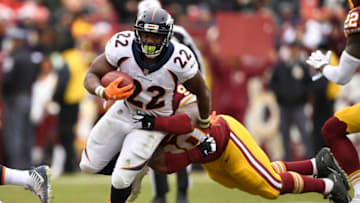 HYATTSVILLE, MD - DECEMBER 24: Denver Broncos running back C.J. Anderson (22) finds a hole in the first half at FedExField in Hyattsville, MD. December 24, 2017. (Photo by Joe Amon/The Denver Post via Getty Images)