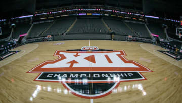 Mar 9, 2022; Kansas City, MO, USA; The Big 12 logo at center court prior to the game between the West Virginia Mountaineers and the Kansas State Wildcats at T-Mobile Center. Mandatory Credit: William Purnell-USA TODAY Sports