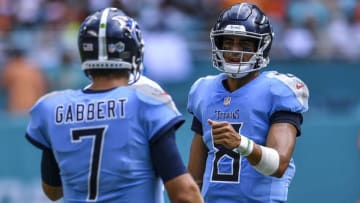 MIAMI, FL - SEPTEMBER 09: Marcus Mariota high fives Blaine Gabbert #7 of the Tennessee Titans after entering the game against the Miami Dolphins at Hard Rock Stadium on September 9, 2018 in Miami, Florida. (Photo by Mark Brown/Getty Images)