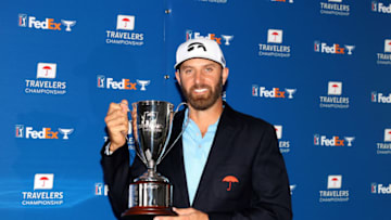 CROMWELL, CONNECTICUT - JUNE 28: Dustin Johnson of the United States poses with the trophy after winning the Travelers Championship at TPC River Highlands on June 28, 2020 in Cromwell, Connecticut. (Photo by Rob Carr/Getty Images)