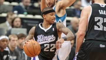 Mar 16, 2014; Minneapolis, MN, USA; Sacramento Kings guard Isaiah Thomas (22) dribbles in the third quarter against the Minnesota Timberwolves at Target Center. The Minnesota Timberwolves win 104-102. Mandatory Credit: Brad Rempel-USA TODAY Sports