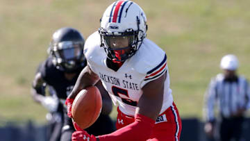 MONTGOMERY, AL - MARCH 20: Wide Receiver Daylen Baldwin #6 of the Jackson State Tigers ater a catch and run during the game against the Alabama State Hornets at New ASU Stadium on March 20, 2021 in Montgomery, Alabama. Alabama State Hornets defeated the Jackson State Tigers 35 to 28. (Photo by Don Juan Moore/Getty Images)