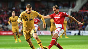 MIDDLESBROUGH, ENGLAND - SEPTEMBER 24: Vincent Janssen of Tottenham Hotspur (L) is tackled by Cristhian Stuani of Middlesbrough (R) during the Premier League match between Middlesbrough and Tottenham Hotspur at the Riverside Stadium on September 24, 2016 in Middlesbrough, England. (Photo by Dan Mullan/Getty Images)