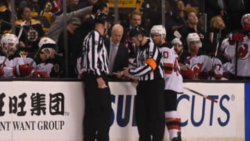 BOSTON, MA - JANUARY 23: Linesman Derek Amell