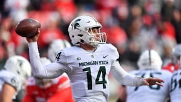 COLUMBUS, OH - NOVEMBER 11: Quarterback Brian Lewerke #14 of the Michigan State Spartans passes in the fourth quarter against the Ohio State Buckeyes at Ohio Stadium on November 11, 2017 in Columbus, Ohio. Ohio State defeated Michigan State 48-3. (Photo by Jamie Sabau/Getty Images)