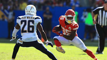 CARSON, CA - SEPTEMBER 24: Casey Hayward #26 of the Los Angeles Chargers defends against the run of Charcandrick West #35 of the Kansas City Chiefs during the second half of a game at StubHub Center on September 24, 2017 in Carson, California. (Photo by Sean M. Haffey/Getty Images)