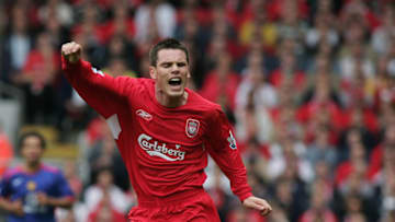 LIVERPOOL, UNITED KINGDOM - SEPTEMBER 18: Steve Finnan of Liverpool is tackled Paul Scholes of Manchester United during the Barclays Premiership match between Liverpool and Manchester United at Anfield on September 18, 2005 in Liverpool, England. (Photo by Ben Radford/Getty Images)