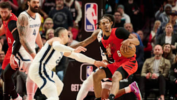 Nov 2, 2022; Portland, Oregon, USA; Portland Trail Blazers guard Keon Johnson (6) spins past Memphis Grizzlies forward Dillon Brooks (24) to the basket during the second half at Moda Center. The Memphis Grizzlies won the game 111-106. Mandatory Credit: Troy Wayrynen-USA TODAY Sports