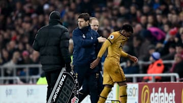 SUNDERLAND, ENGLAND - JANUARY 31: Danny Rose of Tottenham Hotspur is consoled by Mauricio Pochettino, Manager of Tottenham Hotspur as he leaves the field injured during the Premier League match between Sunderland and Tottenham Hotspur at Stadium of Light on January 31, 2017 in Sunderland, England. (Photo by Laurence Griffiths/Getty Images)