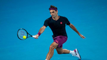 MELBOURNE, AUSTRALIA - JANUARY 30: Roger Federer of Switzerland plays a forehand in his semi-final match against Novak Djokovic of Serbia on day eleven of the 2020 Australian Open at Melbourne Park on January 30, 2020 in Melbourne, Australia. (Photo by TPN/Getty Images)