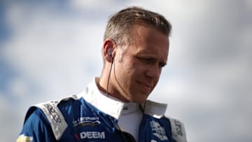 FORT WORTH, TEXAS - JUNE 07: Ed Carpenter of the United States, driver of the #20 Ed Carpenter Racing Chevrolet, stands on the grid during US Concrete Qualifying Day for the NTT IndyCar Series - DXC Technology 600 at Texas Motor Speedway on June 07, 2019 in Fort Worth, Texas. (Photo by Chris Graythen/Getty Images)
