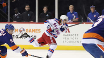 NEW YORK, NEW YORK - NOVEMBER 15: Mats Zuccarello #36 of the New York Rangers takes the third period shot against the New York Islanders at the Barclays Center on November 15, 2018 in the Brooklyn borough of New York City. (Photo by Bruce Bennett/Getty Images)