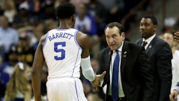 COLUMBIA, SOUTH CAROLINA - MARCH 22: Head coach Mike Krzyzewski and RJ Barrett #5 of the Duke Blue Devils shake hands against the North Dakota State Bison in the second half during the first round of the 2019 NCAA Men's Basketball Tournament at Colonial Life Arena on March 22, 2019 in Columbia, South Carolina. (Photo by Streeter Lecka/Getty Images)