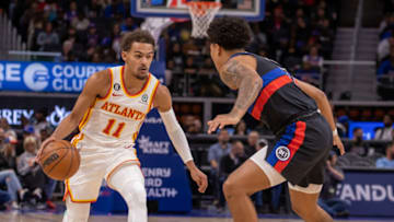 Atlanta Hawks guard Trae Young (11) moves the ball up court against Detroit Pistons guard Killian Hayes Credit: David Reginek-USA TODAY Sports