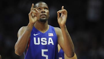 July 24, 2016; Los Angeles, CA, USA; USA guard Kevin Durant (5) checks in before playing against China in the first half during an exhibition basketball game at Staples Center. Mandatory Credit: Gary A. Vasquez-USA TODAY Sports