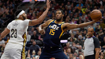 SALT LAKE CITY, UT - JANUARY 03: Derrick Favors #15 of the Utah Jazz looks to pass the ball around Anthony Davis #23 of the New Orleans Pelicans during their game at Vivint Smart Home Arena on January 3, 2018 in Salt Lake City, Utah. NOTE TO USER: User expressly acknowledges and agrees that, by downloading and or using this photograph, User is consenting to the terms and conditions of the Getty Images License Agreement. (Photo by Gene Sweeney Jr./Getty Images)