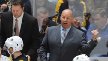Feb 18, 2016; Nashville, TN, USA; Boston Bruins head coach Claude Julien talks with his team during a time out in the third period against the Nashville Predators at Bridgestone Arena. The Predators won 2-0. Mandatory Credit: Christopher Hanewinckel-USA TODAY Sports