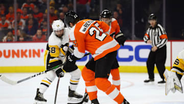 PHILADELPHIA, PA - JANUARY 21: Pittsburgh Penguins Defenceman Kris Letang (58) deflects a shot in front of Philadelphia Flyers Left Wing James van Riemsdyk (25) in the third period during the game between the Pittsburgh Penguins and Philadelphia Flyers on January 21, 2020 at Wells Fargo Center in Philadelphia, PA. (Photo by Kyle Ross/Icon Sportswire via Getty Images)