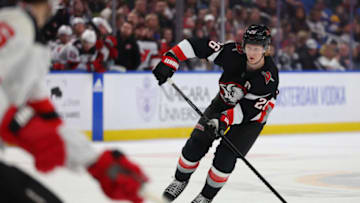 Mar 24, 2023; Buffalo, New York, USA; Buffalo Sabres defenseman Rasmus Dahlin (26) looks to make a pass during the second period against the New Jersey Devils at KeyBank Center. Mandatory Credit: Timothy T. Ludwig-USA TODAY Sports