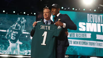 DeVonta Smith poses with NFL Commissioner Roger . (Photo by Gregory Shamus/Getty Images)