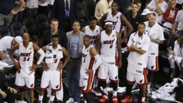 Jun 10, 2014; Miami, FL, USA; (From left to right) Miami Heat fans Katie Jones, Anthony Philosopho, Kaege Jones, and Kim Philosopho cheer outside the stadium prior to game three against the San Antonio Spurs in the 2014 NBA Finals at American Airlines Arena. Mandatory Credit: Robert Mayer-USA TODAY Sports