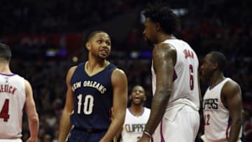 Jan 10, 2016; Los Angeles, CA, USA;New Orleans Pelicans guard Eric Gordon (left) talks with Los Angeles Clippers center DeAndre Jordan (right) during the second quarter at Staples Center. Mandatory Credit: Kelvin Kuo-USA TODAY Sports