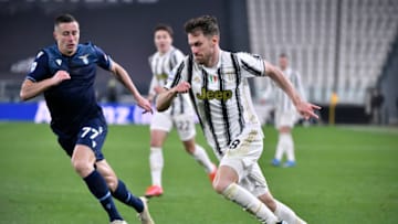 TURIN, ITALY - MARCH 06: (L-R) Adam Marui of SS Lazio against Aaron Ramsey of Juventus FC during the Serie A match between Juventus and SS Lazio at Allianz Stadium on March 6, 2021 in Turin, Italy. (Photo by Stefano Guidi/Getty Images)