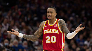PHILADELPHIA, PA - OCTOBER 30: John Collins #20 of the Atlanta Hawks reacts against the Philadelphia 76ers in the first half at the Wells Fargo Center on October 30, 2021 in Philadelphia, Pennsylvania. NOTE TO USER: User expressly acknowledges and agrees that, by downloading and or using this photograph, User is consenting to the terms and conditions of the Getty Images License Agreement. (Photo by Mitchell Leff/Getty Images)