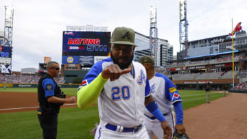 ATLANTA, GA - MAY 20: Marcell Ozuna #20 of the Atlanta Braves returns to the dugout prior to the game against the Seattle Mariners at Truist Park on May 20, 2023 in Atlanta, Georgia. (Photo by Todd Kirkland/Getty Images)