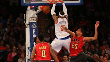 Jan 3, 2016; New York, NY, USA; New York Knicks forward Carmelo Anthony (7) dunks against Atlanta Hawks forward Thabo Sefolosha (25) during the fourth quarter at Madison Square Garden. New York Knicks won 111-97. Mandatory Credit: Anthony Gruppuso-USA TODAY Sports