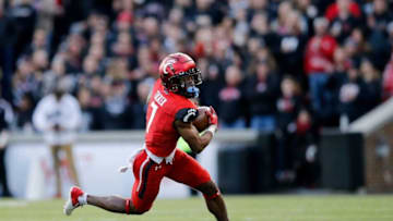 Cincinnati Bearcats wide receiver Tre Tucker catches a pass in the first quarter. The Enquirer.