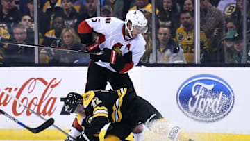 Apr 9, 2016; Boston, MA, USA; Boston Bruins center Frank Vatrano (72) falls to the ice in front of Ottawa Senators right wing Bobby Ryan (6) during the second period at TD Garden. Mandatory Credit: Bob DeChiara-USA TODAY Sports