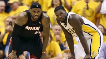 May 18, 2014; Indianapolis, IN, USA; Indiana Pacers guard Lance Stephenson (1) drives to the basket against Miami Heat forward LeBron James (6) in game one of the Eastern Conference Finals of the 2014 NBA Playoffs at Bankers Life Fieldhouse. Indiana defeats Miami 107-96. Mandatory Credit: Brian Spurlock-USA TODAY Sports