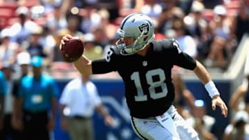 LOS ANGELES, CA - AUGUST 18: Connor Cook #18 of the Oakland Raiders chases a loose ball during the first half of a preseason game against the Los Angeles Rams at Los Angeles Memorial Coliseum on August 18, 2018 in Los Angeles, California. (Photo by Sean M. Haffey/Getty Images)